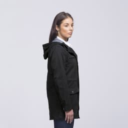A black twill jacket with a hood, featuring a casual design and displayed on a model from the side.