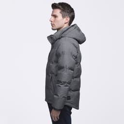 A puffer jacket in grey with a hood, featuring a logo and a side view of a model wearing it.