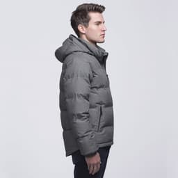 A grey puffer jacket with a hood, featuring a zip closure and side pockets, worn by a man in profile.