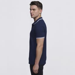 A navy blue men's polo shirt featuring contrasting white trim on the collar and sleeves, with a branding logo.