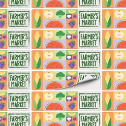 A patterned sheet of stickers featuring various fruits and vegetables in vibrant colours with a logo.