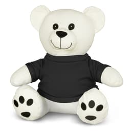 A white plush bear toy wearing a black shirt, featuring black facial details and paw prints. It has a friendly expression.