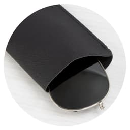 A black sunglass pouch partially covering a pair of dark sunglasses, featuring a logo.
