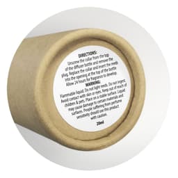 A cylindrical container for a scented diffuser, featuring a natural brown colour, with a warning label.