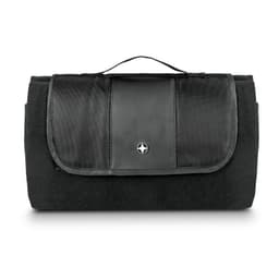 A folded black picnic blanket with a carrying handle and a textured panel on the front, featuring a logo.