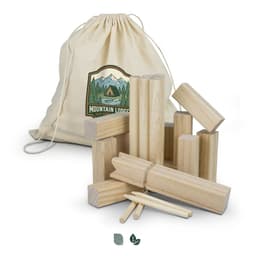 A set of natural wooden Kubb game pieces, stacked alongside a cream drawstring bag with a logo.