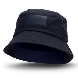 A navy bucket hat with a patch area, featuring a wide brim and a relaxed fit.
