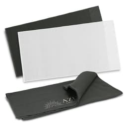 A dark green and white waffle towel set, featuring a logo on the dark green towel.