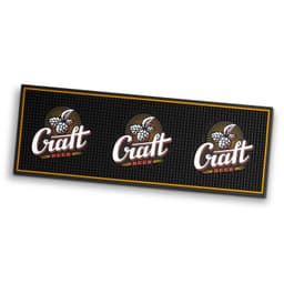 A large black PVC bar runner featuring three logos with a craft beer theme, accented with gold details.