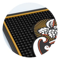 A large PVC bar runner in black with a textured surface and a decorative logo design in gold and white.