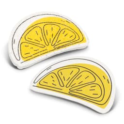 Two expandable sponges shaped like lemon slices, one white and one yellow, featuring detailed fruit designs.