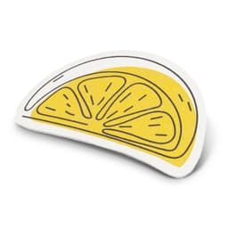 A lemon slice-shaped expandable sponge in yellow and white with outlined details. It features a simple design.