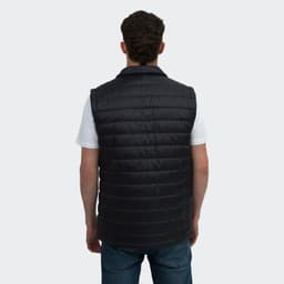A unisex black puffer vest, featuring a quilted design and a collar, viewed from the back.