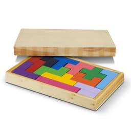 A wooden puzzle set with multicoloured geometric pieces, housed in a natural wooden box with a lid.