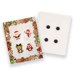 A pack of four custom shoe charms featuring Santa, a snowman, a penguin, and a reindeer, all in festive colours.