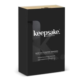 A black box containing Keepsake Noir salt and pepper grinders, featuring a sleek logo and elegant design.