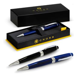 A blue metal ballpoint pen with silver accents, presented in a black gift box featuring a logo.