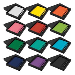 A gift set featuring Omega notebooks and pens in various colours, presented in stylish black boxes.