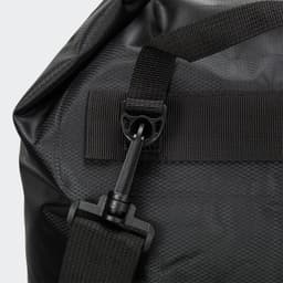 A black dry bag with a durable finish, featuring a secure clasp and adjustable strap for easy carrying.